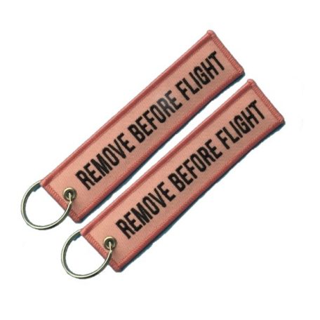 RBF kulcstartó  rózsaszín "Remove Before Flight"